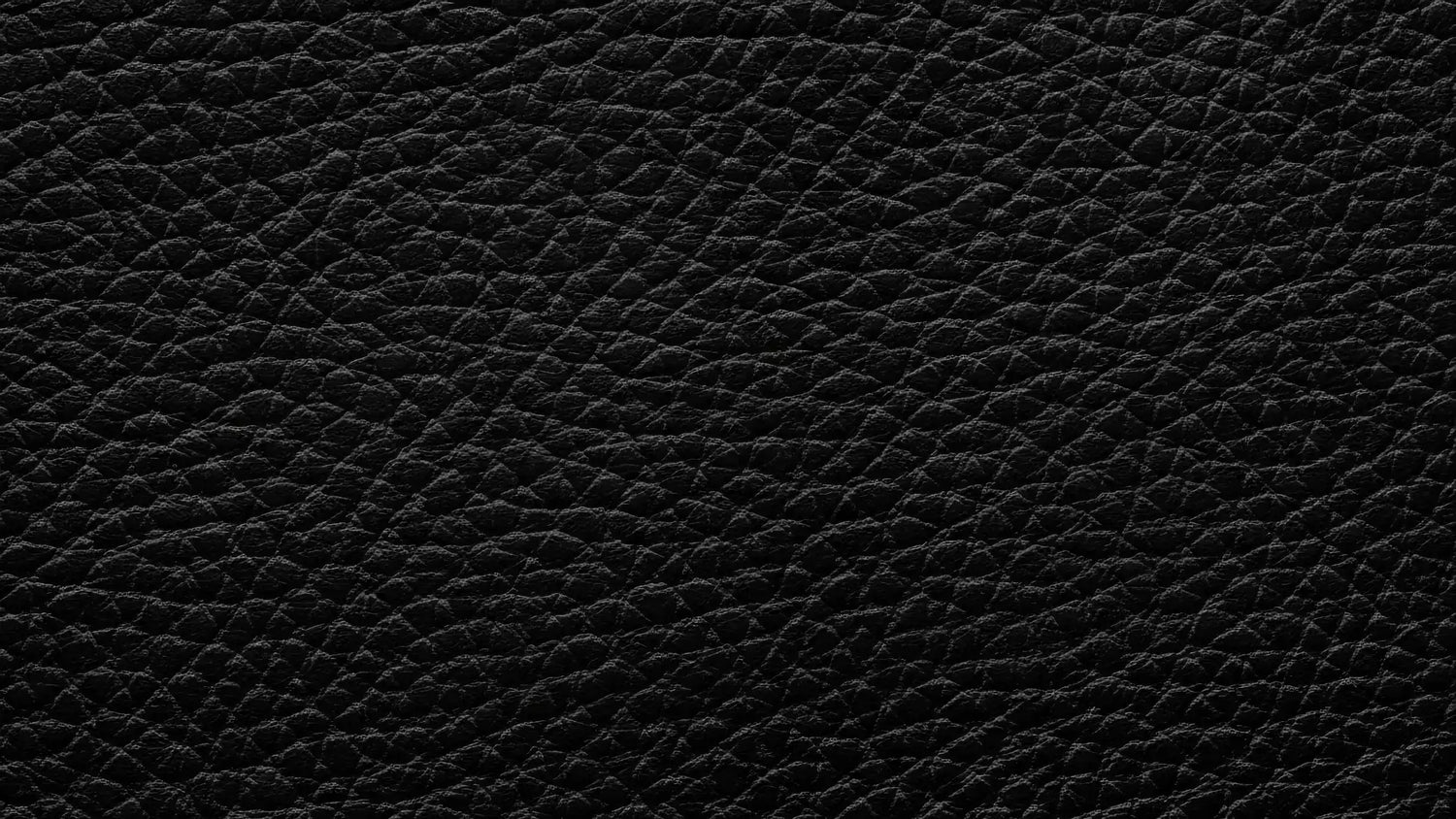 Dunkle, hochwertige Ledertextur mit genarbter Struktur und weicher Haptik