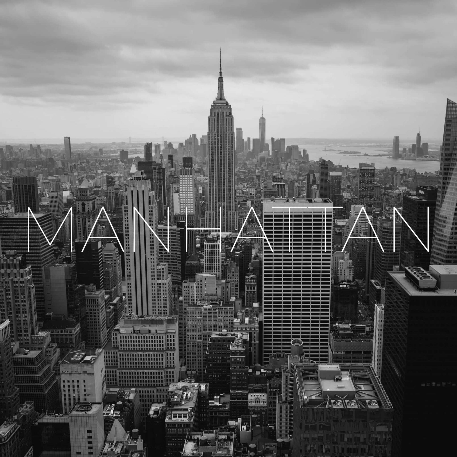 Skyline von Manhattan in New York mit Schriftzug Manhattan | uhrenrolle